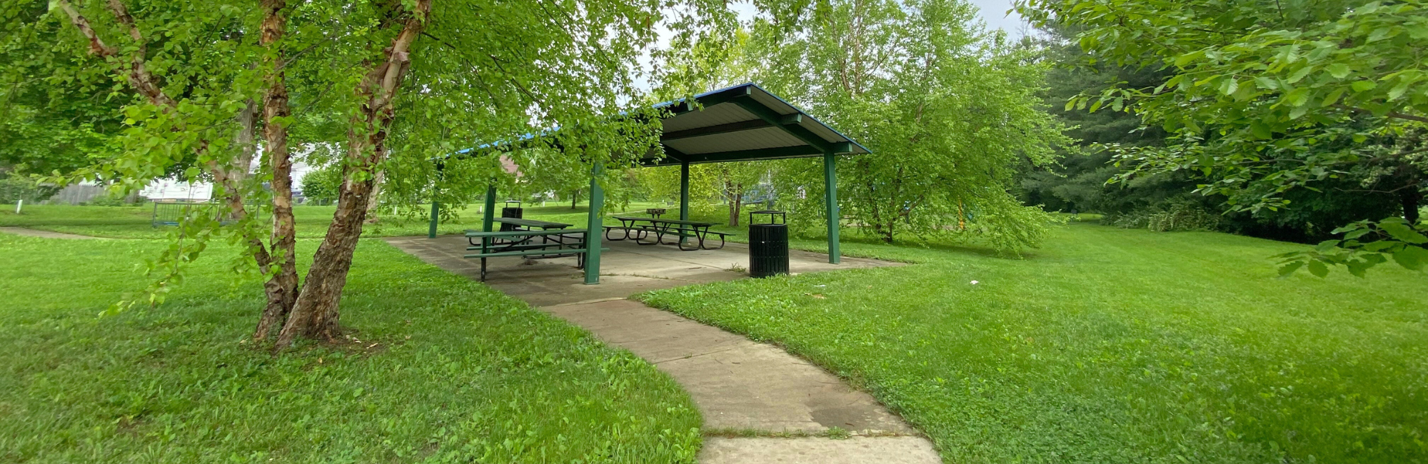 Park with a pathway to a shelter