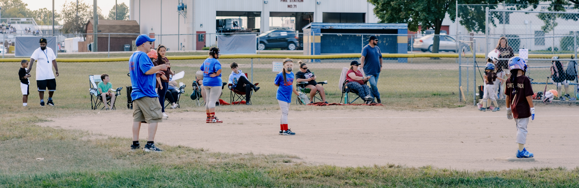 youth baseball game at park