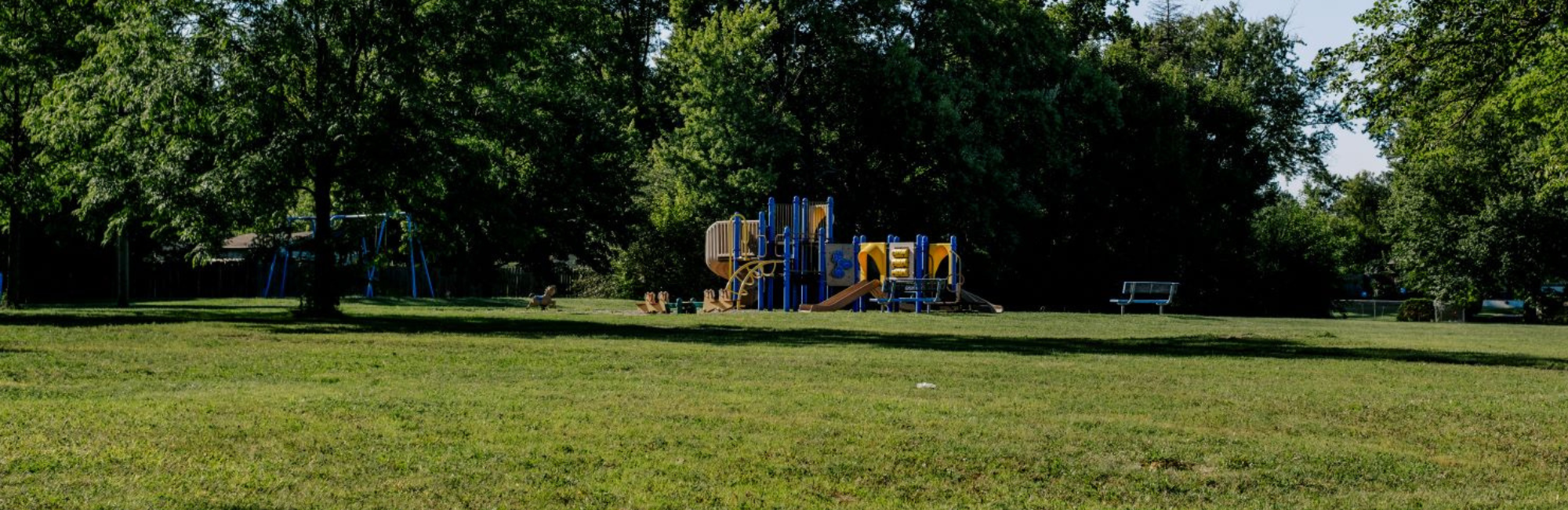 park with playground in distance
