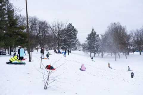 People sledding at Rhodius Park